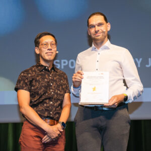 ISC 2026 Best Student Paper Award Winner Niklas Bahr with ISC 2027 Research Paper Chair Richard Vuduc